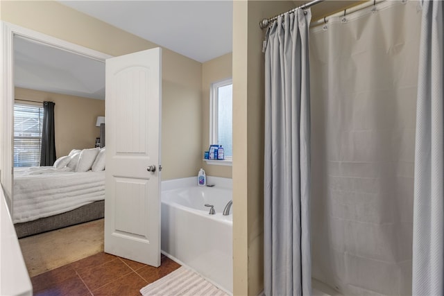 ensuite bathroom with curtained shower, a garden tub, connected bathroom, and tile patterned floors