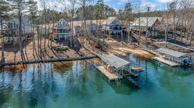 dock area featuring a water view and boat lift