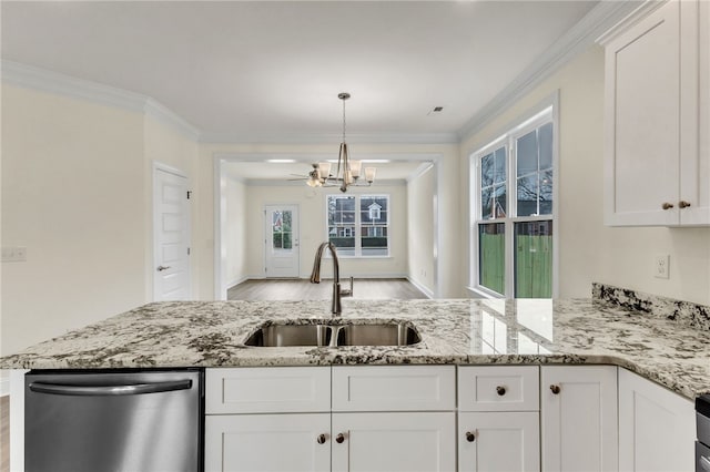 kitchen featuring dishwasher, ornamental molding, a sink, and white cabinets