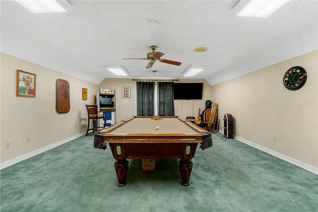 recreation room with carpet flooring, vaulted ceiling, and baseboards