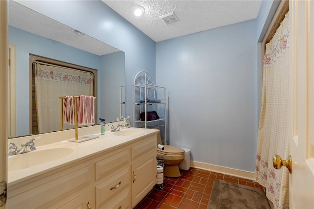 full bathroom with visible vents, a sink, a textured ceiling, and toilet