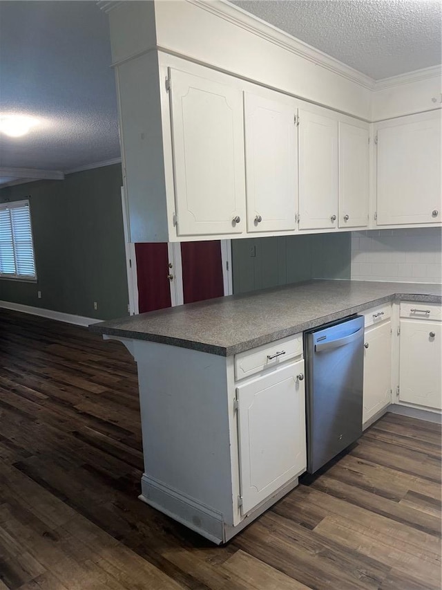 kitchen featuring dark wood finished floors, crown molding, a textured ceiling, and stainless steel dishwasher