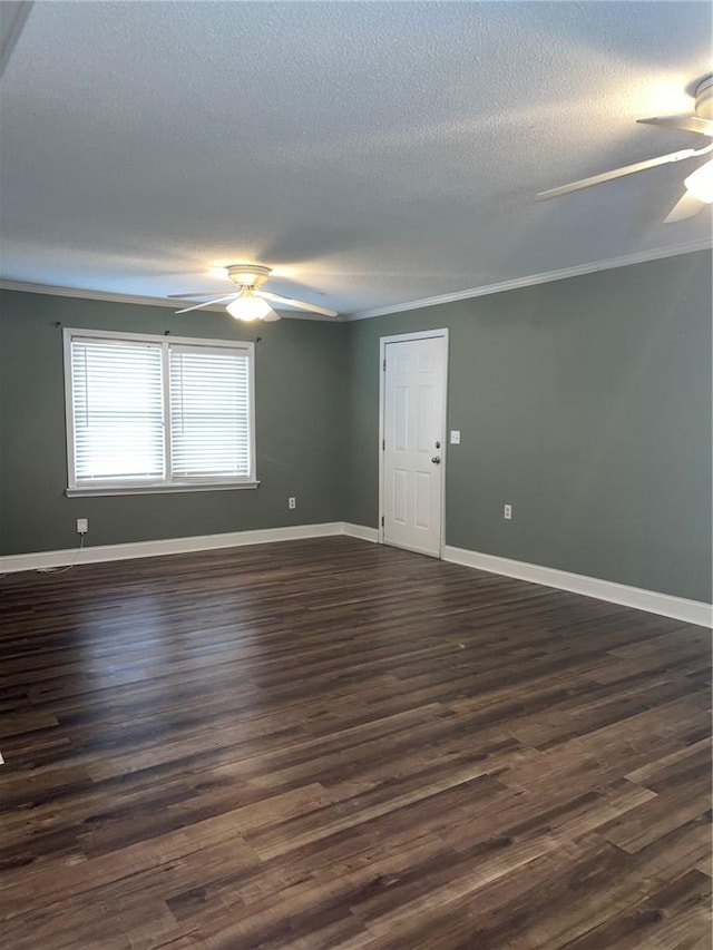 spare room with dark wood-style floors, ceiling fan, and crown molding