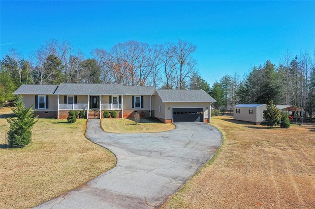 ranch-style home with crawl space, aphalt driveway, a porch, and a front yard