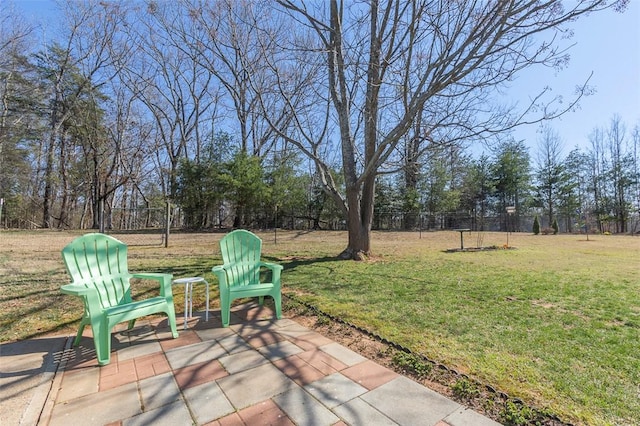 view of patio / terrace featuring fence