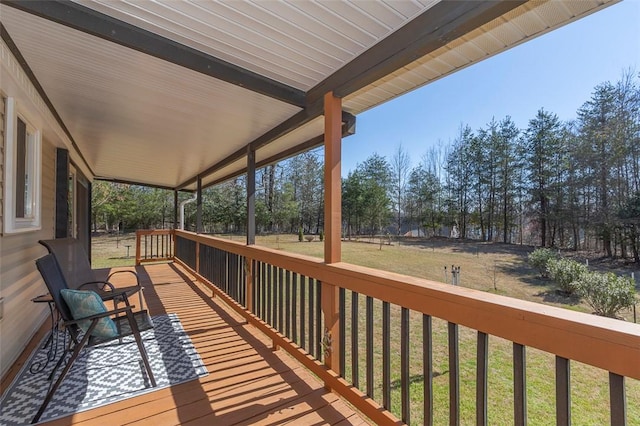 deck featuring a lawn