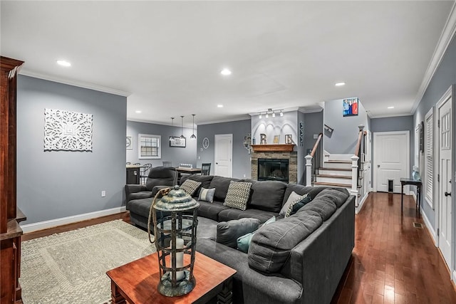 living area with recessed lighting, dark wood-style flooring, baseboards, stairway, and crown molding