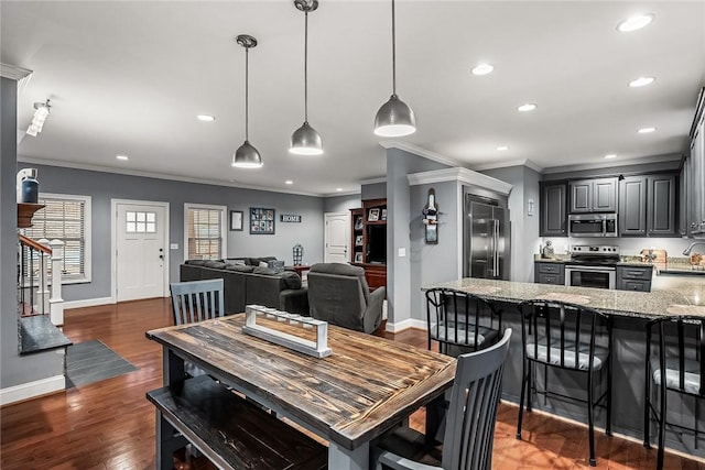 dining area with dark wood-type flooring, stairway, recessed lighting, and crown molding