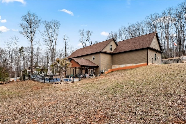 rear view of house with a patio and a gazebo