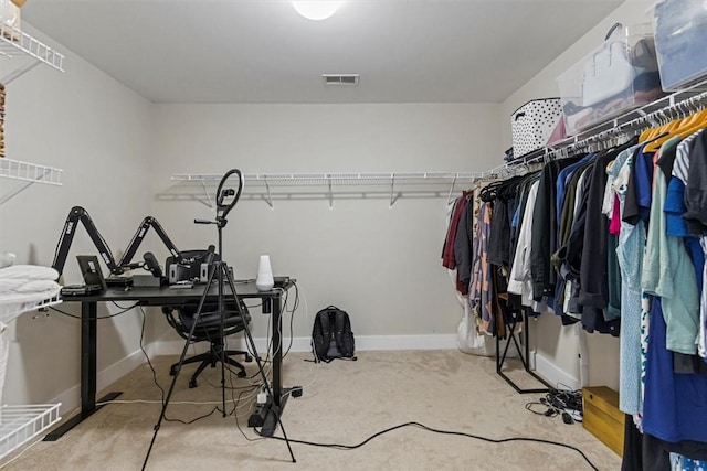 walk in closet with carpet and visible vents