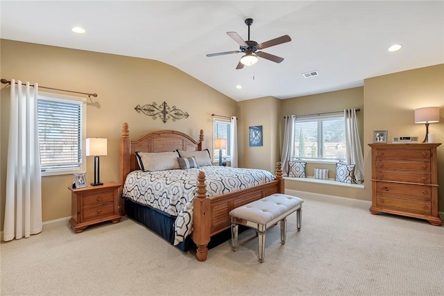 bedroom with lofted ceiling, light carpet, visible vents, and recessed lighting