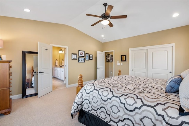 bedroom featuring recessed lighting, light carpet, baseboards, vaulted ceiling, and a closet