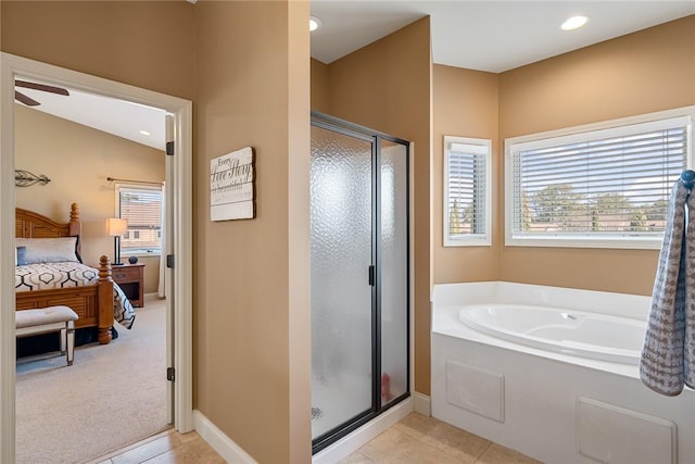 full bath with a garden tub, a shower stall, tile patterned flooring, and connected bathroom