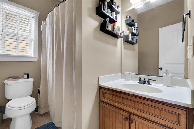 full bath featuring vanity, curtained shower, tile patterned flooring, and toilet