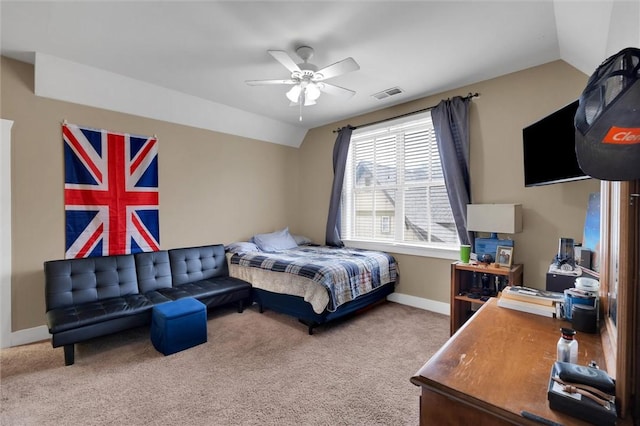 bedroom featuring visible vents, baseboards, ceiling fan, carpet, and vaulted ceiling