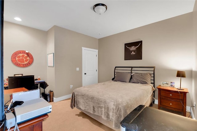 bedroom featuring carpet flooring and baseboards