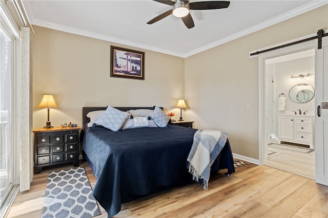 495TALLSHIP240 Tall Ship Dr, Salem, SC 29676 - bedroom with light wood-type flooring, ornamental molding, a barn door, connected bathroom, and baseboards