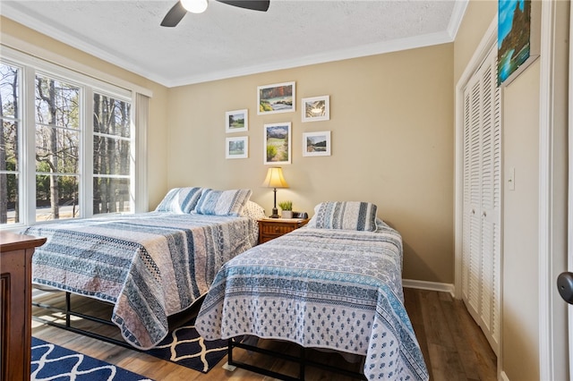 495TALLSHIP240 Tall Ship Dr, Salem, SC 29676 - bedroom featuring wood finished floors, crown molding, a closet, a textured ceiling, and baseboards