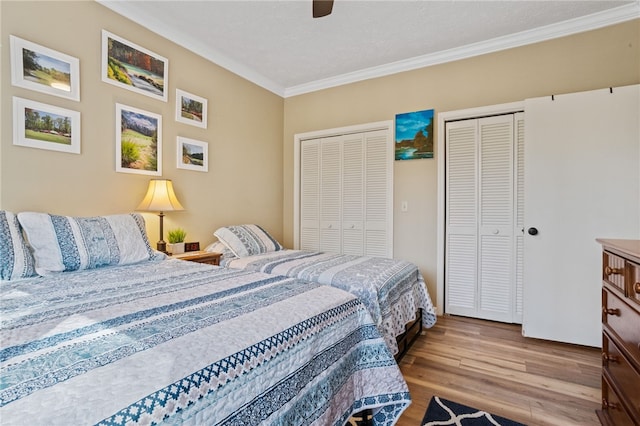 495TALLSHIP240 Tall Ship Dr, Salem, SC 29676 - bedroom featuring two closets, ornamental molding, wood finished floors, and ceiling fan