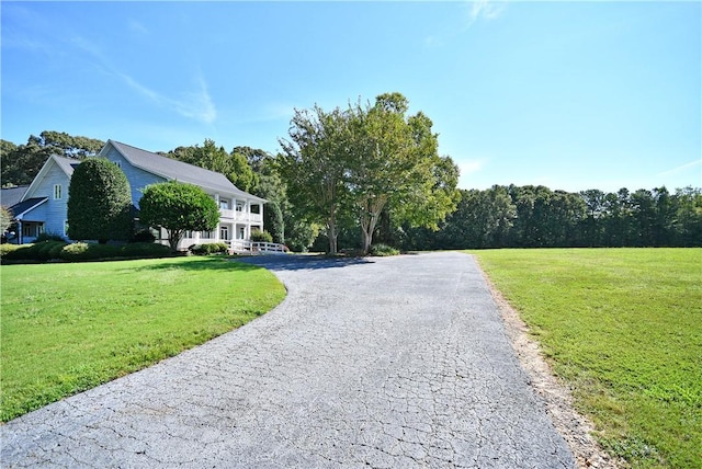 view of road featuring driveway