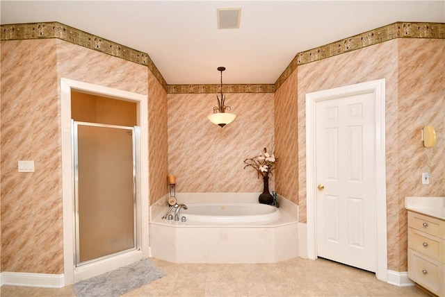 full bathroom with visible vents, a shower stall, vanity, a bath, and tile patterned floors