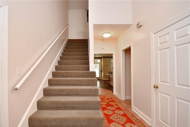 stairway with baseboards