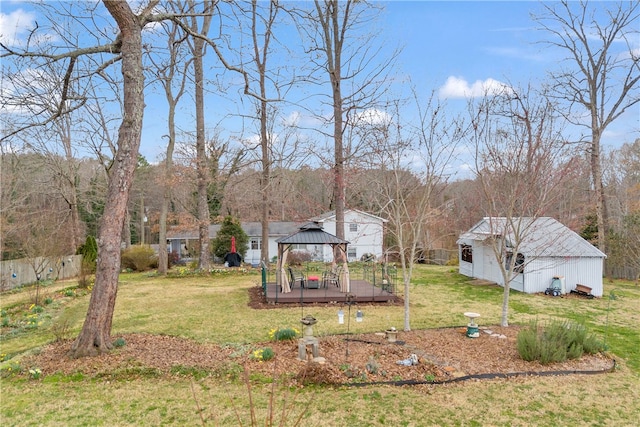 view of yard featuring an outbuilding and a gazebo