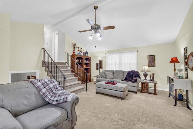 living room featuring carpet floors, stairway, lofted ceiling with beams, a ceiling fan, and baseboards