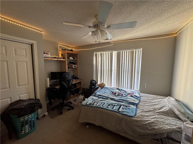 carpeted bedroom with ceiling fan, multiple windows, and a textured ceiling