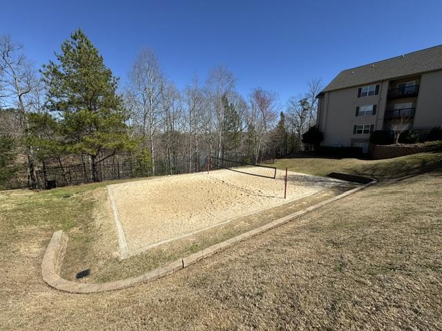 view of community featuring volleyball court