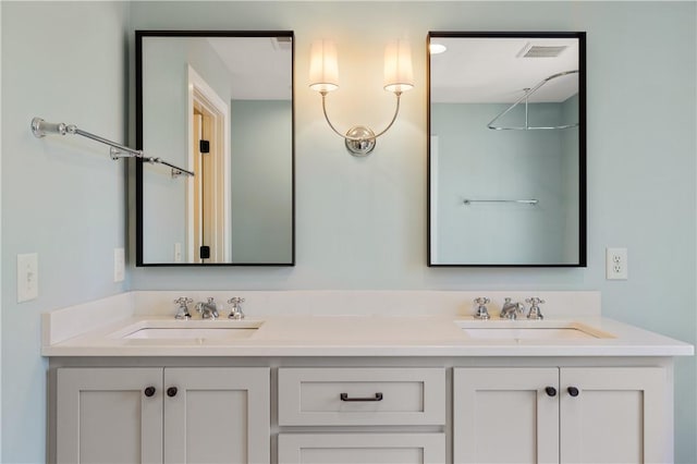 bathroom with double vanity and a sink