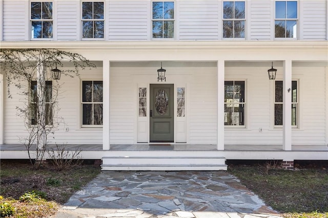 property entrance with a porch