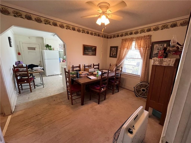 303 Corning St, Anderson, SC 29624 - dining space with arched walkways, a ceiling fan, and ornamental molding