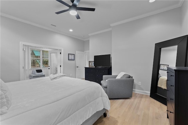 bedroom with ceiling fan, visible vents, baseboards, ornamental molding, and light wood-type flooring