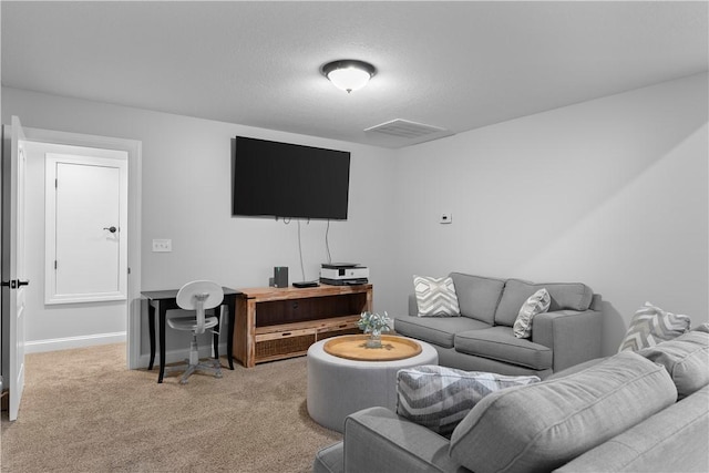 living area featuring light colored carpet, visible vents, and baseboards