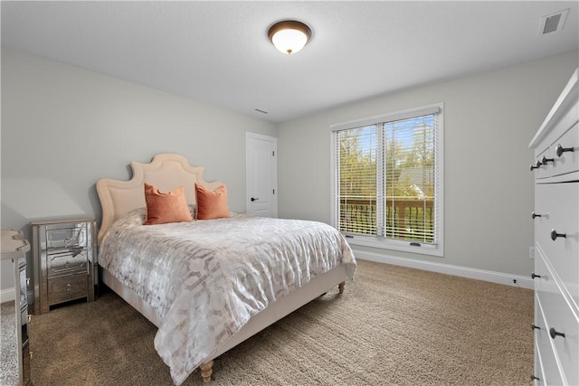 bedroom featuring carpet, visible vents, and baseboards