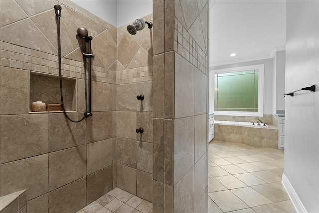 bathroom featuring crown molding, tile patterned flooring, a tile shower, and a bath