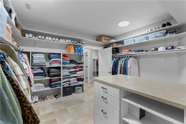 walk in closet with visible vents