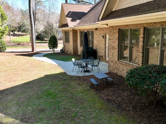 view of yard with a patio area