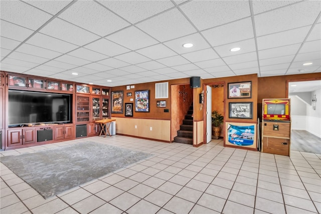 unfurnished living room featuring recessed lighting, stairs, visible vents, and tile patterned floors