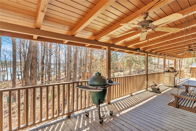 deck featuring ceiling fan and grilling area