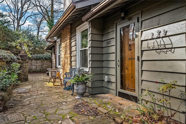 property entrance with a patio