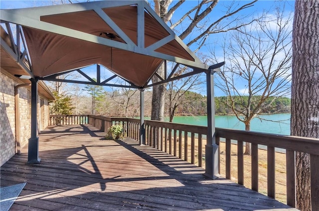 wooden deck with a water view