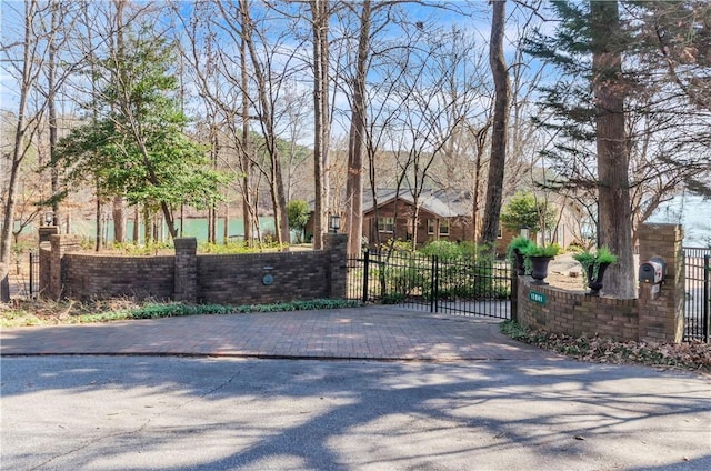 view of gate featuring fence