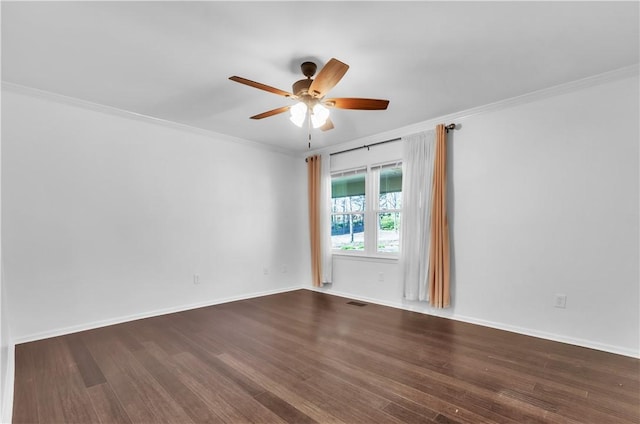 unfurnished room featuring baseboards, visible vents, ceiling fan, ornamental molding, and dark wood-type flooring