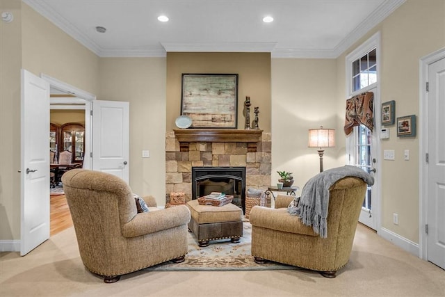 living room featuring a stone fireplace, ornamental molding, recessed lighting, and baseboards