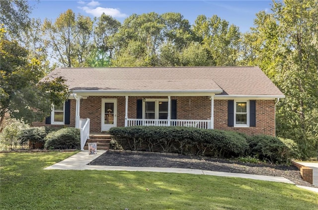 400 Quail Run Cir, Fountain Inn, SC 29644 - single story home with brick siding, a front lawn, a porch, and roof with shingles