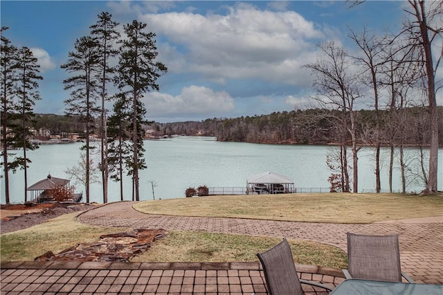 view of water feature with a view of trees