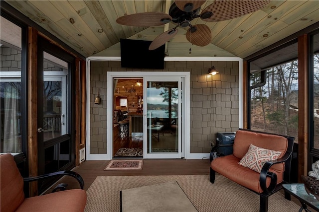 entrance to property featuring ceiling fan