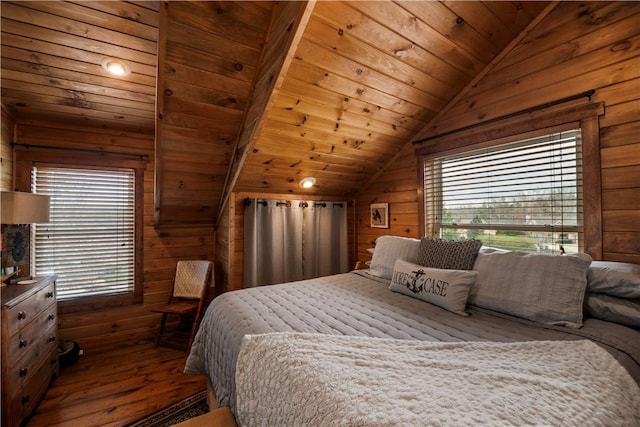 bedroom with lofted ceiling, multiple windows, wood walls, and wood ceiling